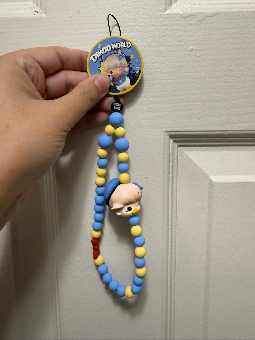 Dimoo World Donald bag/phone charm